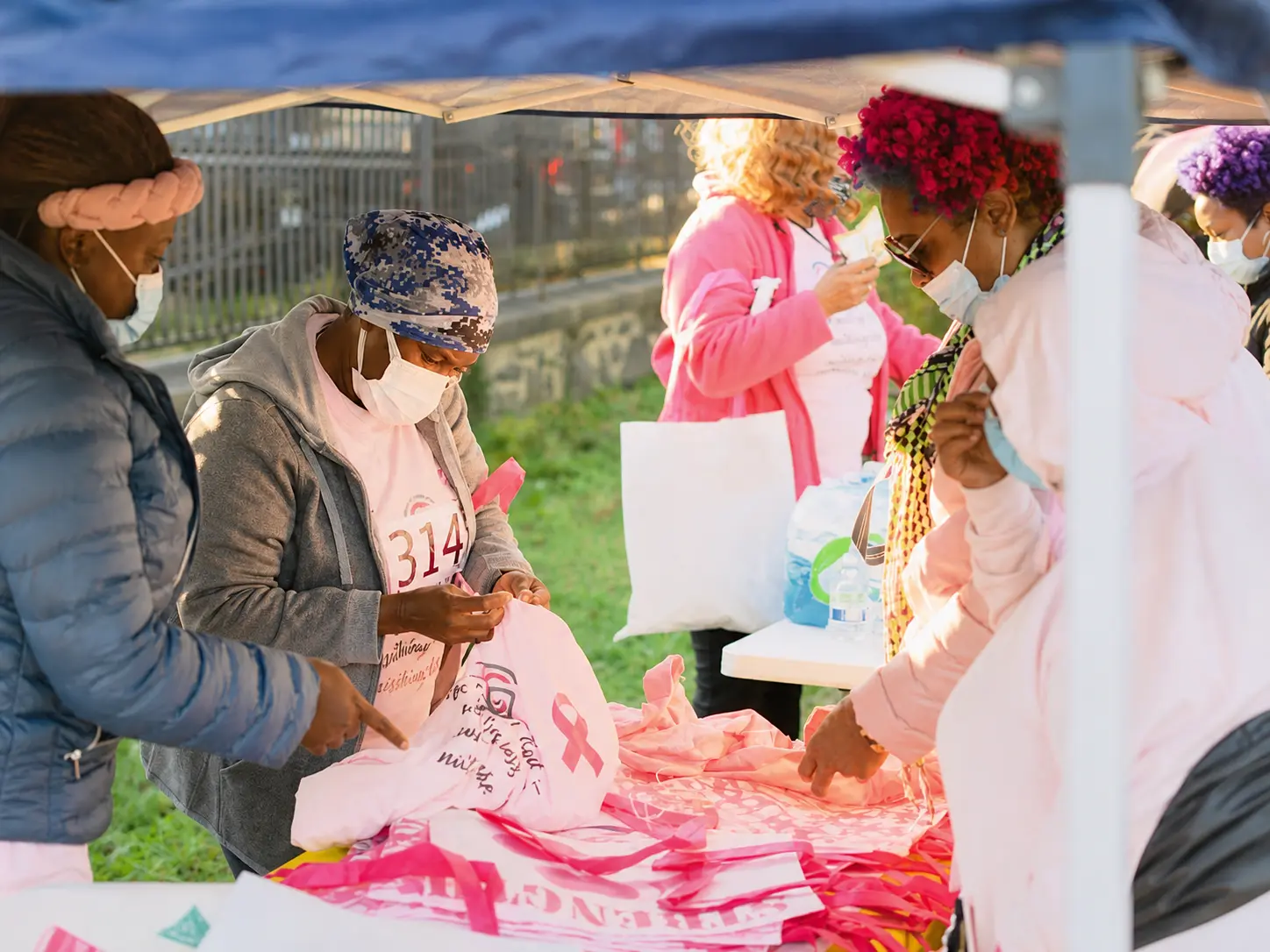 Women taking part in a Caribbean Girls Mission of Hope breast cancer awareness event