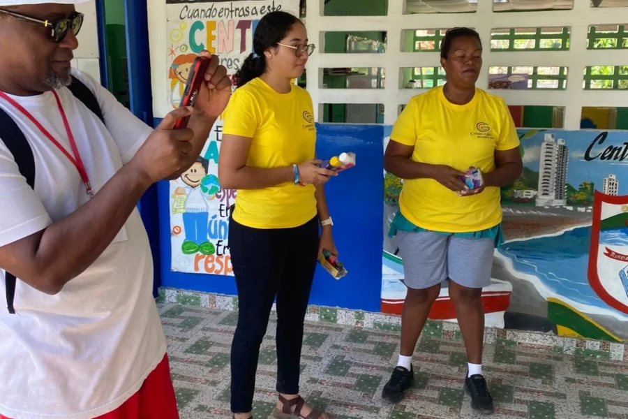CGMOH volunteers lead a presentation inside the children's center