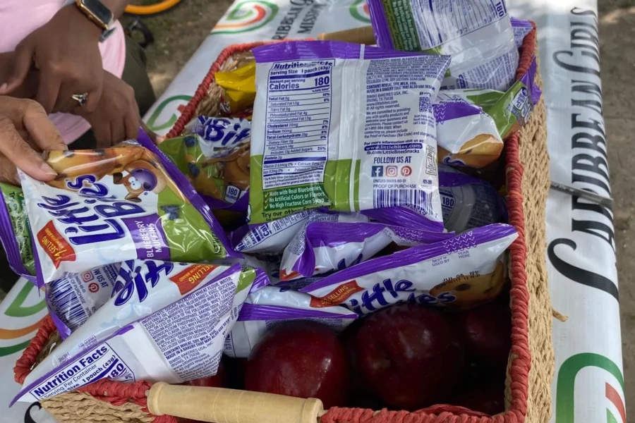 A gift basket filled with snacks and everyday essentials for a Father's Day recipient